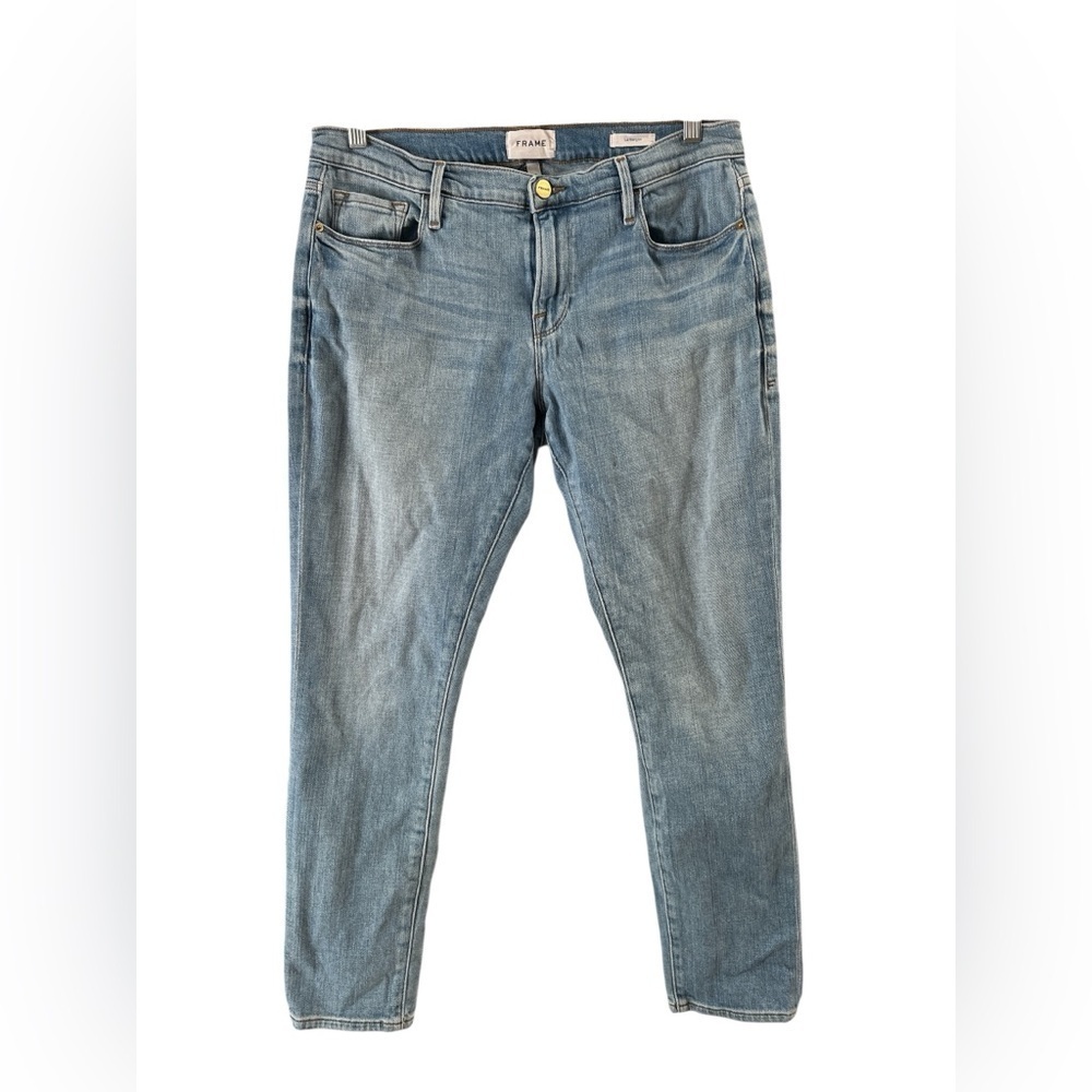 FRAME light wash mid rise skinny jeans